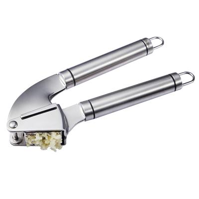 China Multifunctional Kitchen Instrument Viable Metal Garlic Press Peeler Garlic Crusher for sale