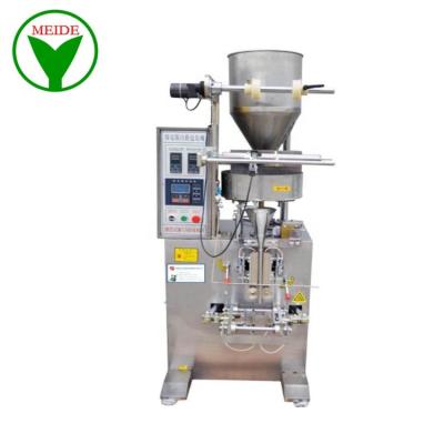 China Food 304 Stainless Steel Film Width 320mm And 420mm Max Volumetric Cup Filler Measuring Packing Machine for sale