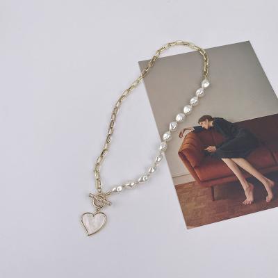 China Temperament Simple Trendy Freshwater Pearl Necklace Design Buckle Design OT Metal Splicing Necklace Female for sale