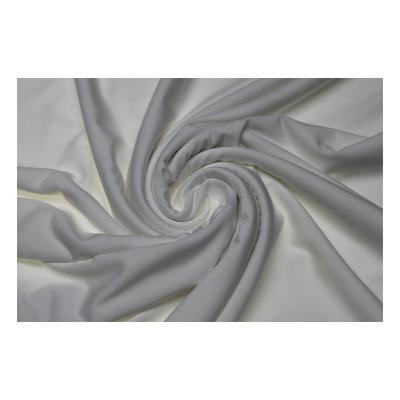 China Stretch Good Price Of Good Quality Black/White Polyester Clothing Fabric Single-Sided Polyester Ammonia Semi-Gloss Cloth for sale