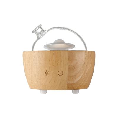 China Trigger blood and guarantees essential oil diffuser forsolid wood dredge glass diffuser for sale