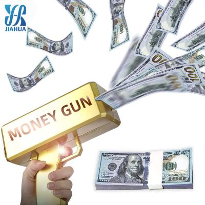 China Shoot Power 2022 Gold Money Gun Make Dollar Bill Plastic Gun Box Shot Cash Money Rain Spread Real Money Gold Gun Toy for sale