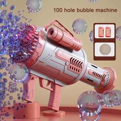 China Outdoor Bubble Blowing Maker Amazon Rocket Boom Gatling Hot 100 Holes Bubble Machine Toy Automatic Ble Machine Electric Bubble Gun for sale