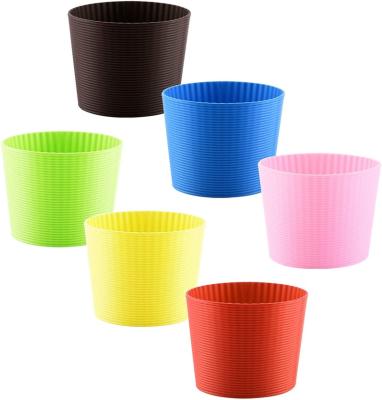 China FREE SAMPLE Stocked New Style Assorted Colors Heat Resistant Silicone Coffee Cup Sleeve For Coffee Cup for sale