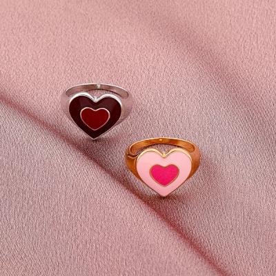 China New Environmentally Friendly Creative Gold Plated Seal Ring Oil Dropping Double Heart Chunky Heart Ring for sale