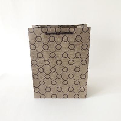 China Custom Printing Circle Recyclable Dot Brown Paper Bags With Your Own Logo Cheap Kraft Paper Bag for sale