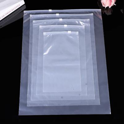 China BIODEGRADABLE resealable pe zipper bags transparent zipper slider bags for clothes for sale