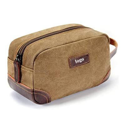 China Reusable Custom Portable Canvas Travel Toiletry Bag Toiletry Organizer Dopp Kit Men Shaving Bag For Men for sale