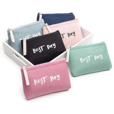 China Wholesale Reusable Portable Cute Canvas Cosmetic Bags Travel Makeup Pouch Cosmetic Clutch Purse For Women for sale