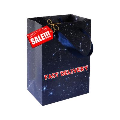 China Biodegradable high quality wholesale sky gift bag mall shopping cheap starry paper bag small for sale