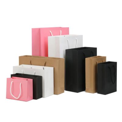 China High quality biodegradable custom printing big black and pink Chinese paper bag new year paper bag for sale