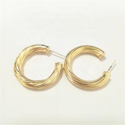 China Vintage Fashion Shiny C-circle Twisted Earrings Gold Plated Earings Woman Unique Fashion Earing For Women for sale