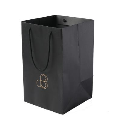 China Recyclable Luxury Black Kraft Folding Shopping Gift Paper Bag for sale