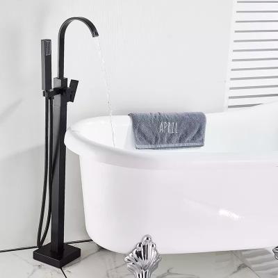 China Without Slide Bar Matte Black Floor Mount Brass Single Handle Bathroom Faucets With Free Hand Shower Waterfall Tub Filler Bathtub Faucet for sale