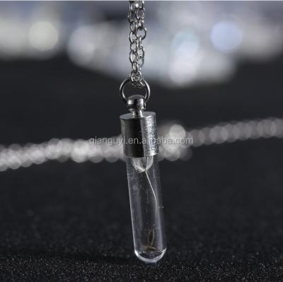 China CLASSIC Glass Perfume Bottles Lucency Rice Vials Rice Pendants Vial Pendant Empty Glass Perfume Tubes for sale