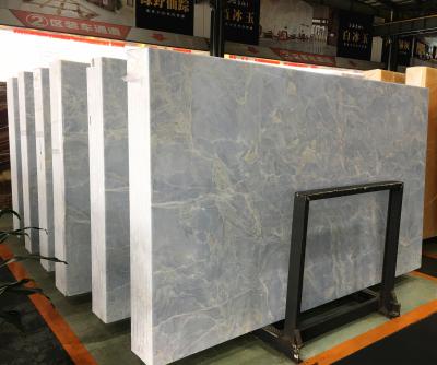 China Diseno de decoracion de piso de proyecto de modern villa precio natural ice blue onyx for sale