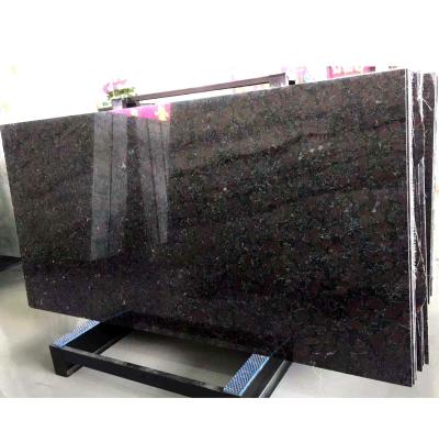 China Backlit Effect of Rose Black Luxury Granite Tiles at Traditional Night for sale