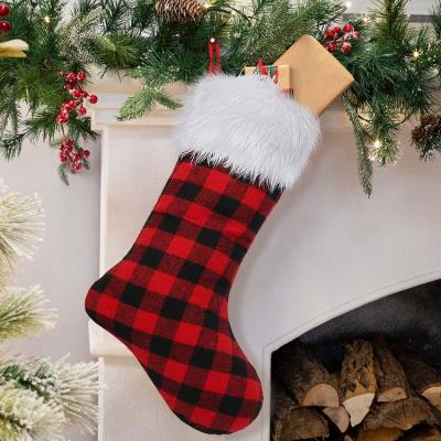 China Christmas Decor and New Year Decoration Competitive Price 18 Inch Cotton Snowflake Red and Black Buffalo Plaid Faux Fur Christmas Stocking for sale