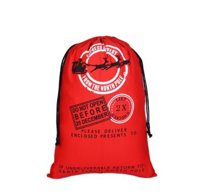 China Hot Sale Fashionable Wholesale Canvas Drawstring Kid's Backpack Santa Bag For Christmas for sale