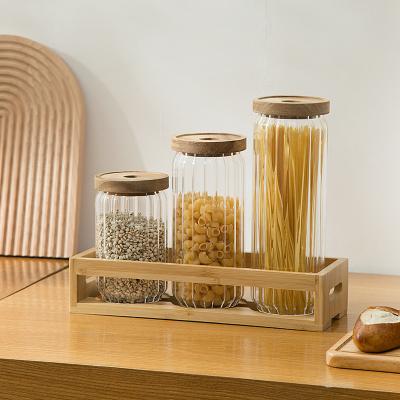 China Sustainable The most practical and beautiful acacia wood lid glass sealed storage jar for sale