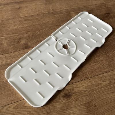 China 2022 New Arrival Stocked Silicone Kitchen Faucet Sink Splash Guard Mat for sale