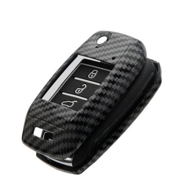 China Abs+silicon fashion carbon colors plastic material for KIA head cover for sale