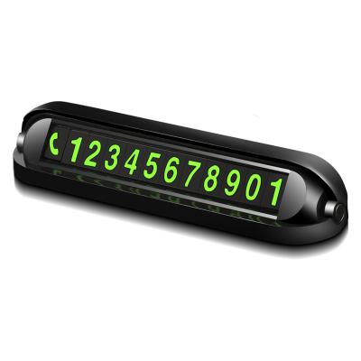 China Slip To Hide Gepai Car Accessories Temporary Parking Card Night Light Mobile Phone Turning With Scent Hide Number Dash Plate for sale