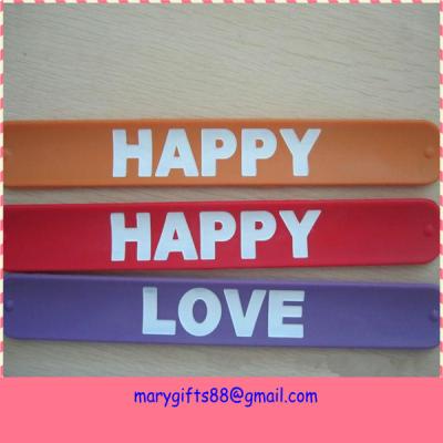 China silicone rubber snap on wristbands for sale