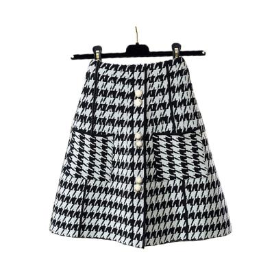 China Wholesale Anti-Static Women's High Waist Plaid A Line Elastic Knitted Mini Skirts With Pockets for sale