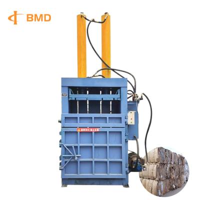 China Hay Waste Paper Baler Machine Mini Pressing And Strapping Machine for sale