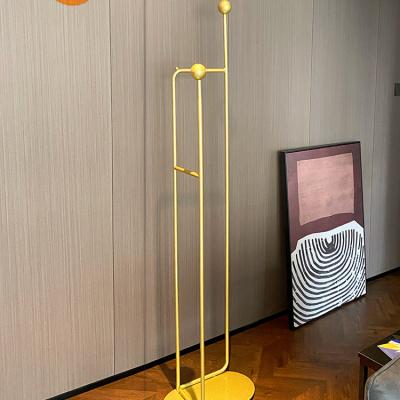 China Wholesale Durable Light Luxury Modern Wind Bedroom Metal Coat Rack Multifunctional Hotel Storage Rack for sale