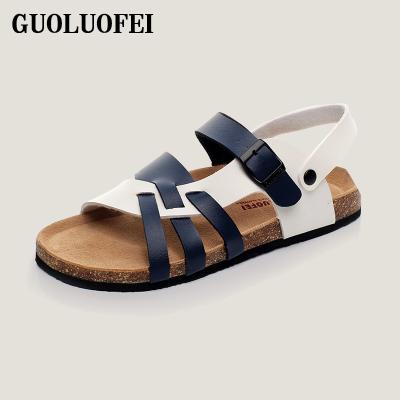 China Fashion Trend Cross Straps Leather Trim Sandals For Men Women Unisex Summer Cork Flat Casual Slippers With Metal Buckles for sale