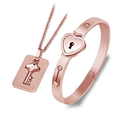 China Free Shipping TRENDY Stainless Steel Jewelry Set Heart Love Lock Bracelet Key Necklace For Couples Set Women Zircon Wedding Gift for sale