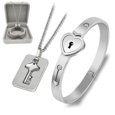 China TRENDY Stainless Steel Jewelry Sets Include Box Heart Lock Bracelet Key Necklace For Couples Set Women Zircon Wedding Gift for sale