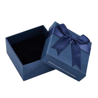 China Handmade Classic Blue Ring Storage Gift Box Bowknot Jewelry Necklace Earrings Square Craft Paper Gift Box for sale