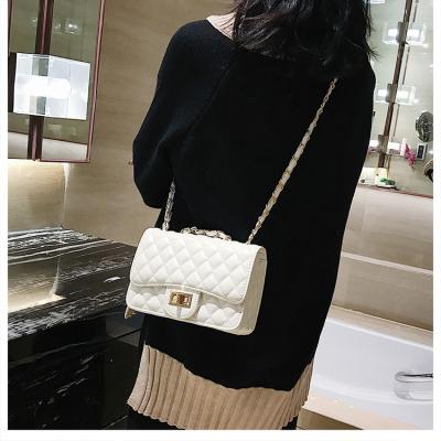 China Lady Luxury Single Shoulder Lattice Leather Lady Bag Women's PU Diamond Handbags for sale