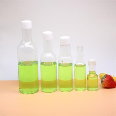 China New Cheap Juice Tea Bottle Plastic Wine Creative Juice Bottle Coffee Pet Whiskey Wine Drink Bottle for sale