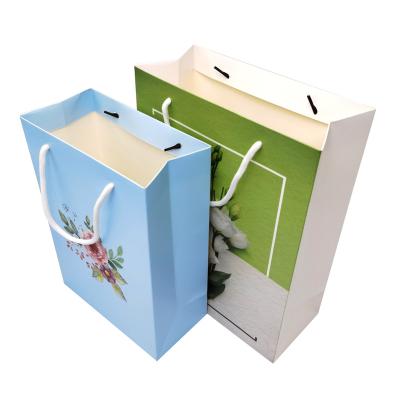 China Recycled Materials Fashion Custom Printing Luxury Gift Shopping Paper Bags for sale