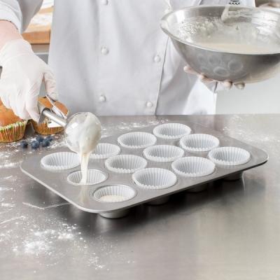 China RK Bakeware China-12 Compartment Fluted 1.5mm Muffin Baking Pan Glazed Aluminized Steel for sale