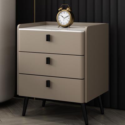 China Modern Wholesale Bedroom Drawer Storage bedside table modern night stand minimalist beige gold nightstand for sale