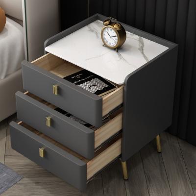 China Modern High End new Exquisite wooden bedside table with 3 drawers furniture modern night stand metal nightstand for sale