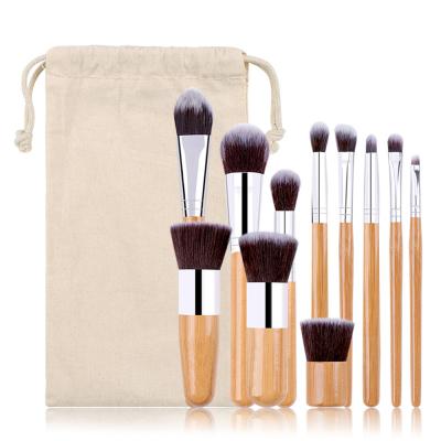 China Angular blush XINYAN whosale bamboo makeup brush 11pcs private label synthetic hair blush eco-friendly cosmetic wooden brush for sale