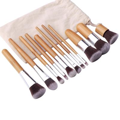 China Angular Blush XINYAN 11pcs Professional Synthetic Hair Private Label Makeup Brushes Wooden Handle Makeup Brush for sale