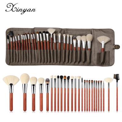 China XINYAN Elegant 26pcs Goat Hair Makeup Brush Set Custom Logo Soft Wooden Handle Cosmetic Brush Hair Brush for sale