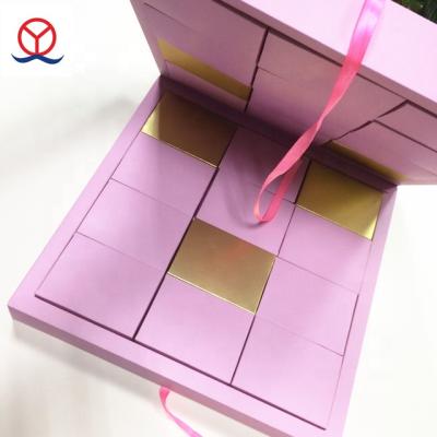 China Large Recyclable Luxury Wholesale Pink Book Shape Christmas Advent Calendar Gift Box With 24 Small Boxes for sale