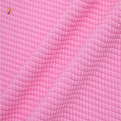 China New Heat-Insulation Diamond Checked Flower Knit Floral Jacquard Fabric 100% Polyester Fabric For Garment for sale