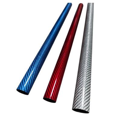 China Corrosion Resistance Roll Wrapped Tube Colorful Carbon Fiber Tubing For Equipment Shaft for sale