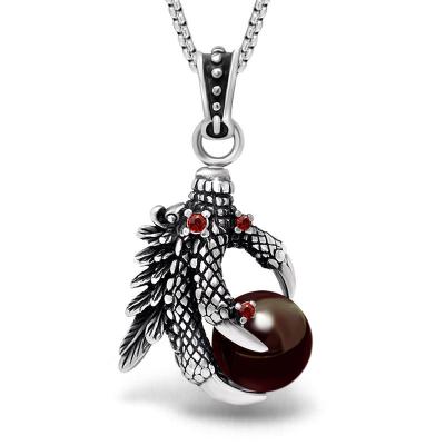 China Vintage Mens Jewelry Gothic Casting Eagle Dragon Claw With Red Gemstone Pendant Design for sale