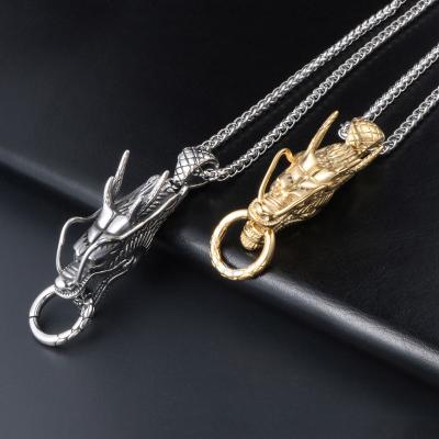 China Vintage Hot Sales Punk Dragon With Ring Zodiac Titanium Steel Gold Pendant For Men Wholesale for sale