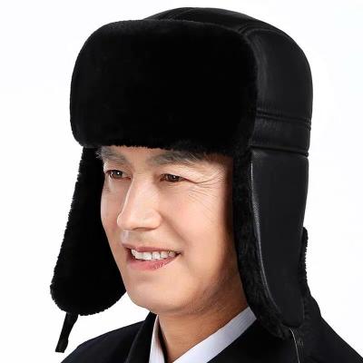 China Waterproof Warm Ear Flaps Fur Winter Hat Bomber Leather Male Trapper Hat for sale